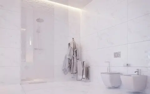 Nowoczesna łazienka z prysznicem i bidetem. Płytki 120x60 ułożone pionowo, tworząc elegancką przestrzeń.